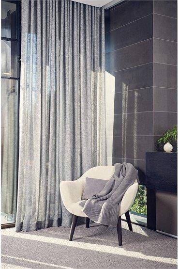 A Living Room With A Couch — Mid Coast Flooring & Blinds In Harrington, NSW