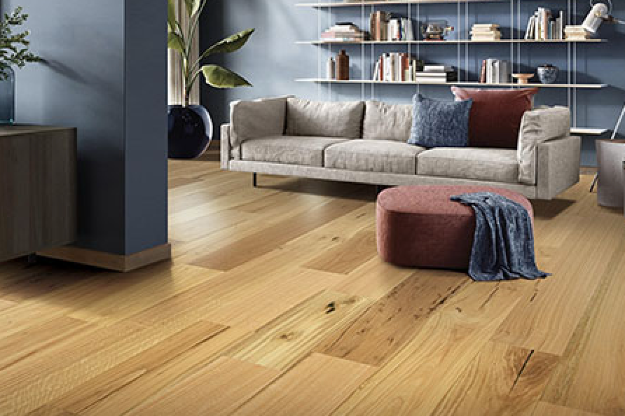 A Close Up Of A Wooden Floor Being Installed With Glue — Mid Coast Flooring & Blinds In Old Bar, NSW