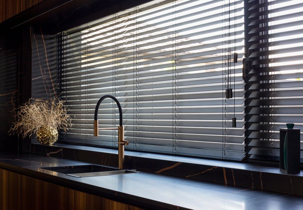 A Kitchen with A Sink and A Window with Blinds — Mid Coast Flooring & Blinds In Forster, NSW