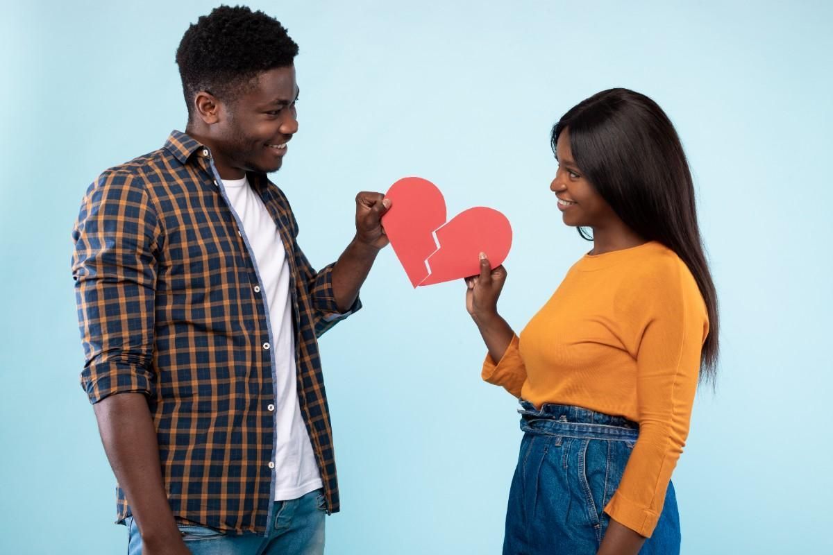 couple holding broken heart