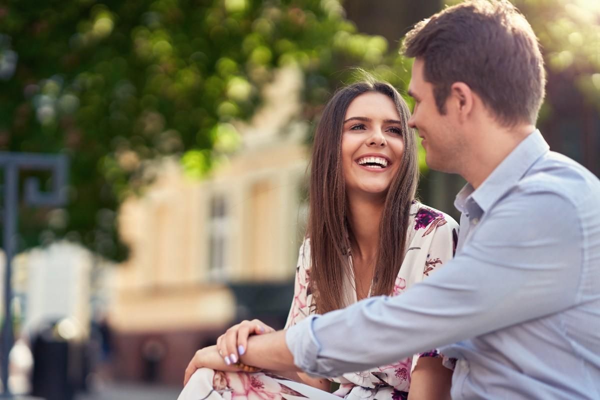 girl facing his partner and smilling