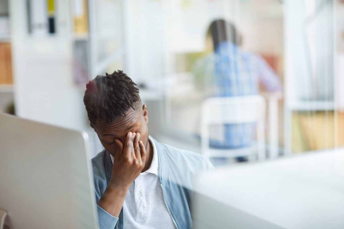 man feeling stressed and frustrated with dating challenges
