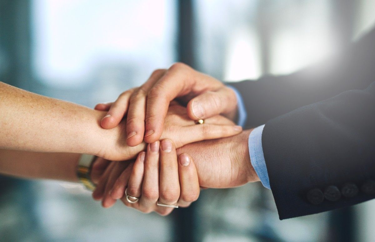 man and woman holding hands showing connection through matchmaking