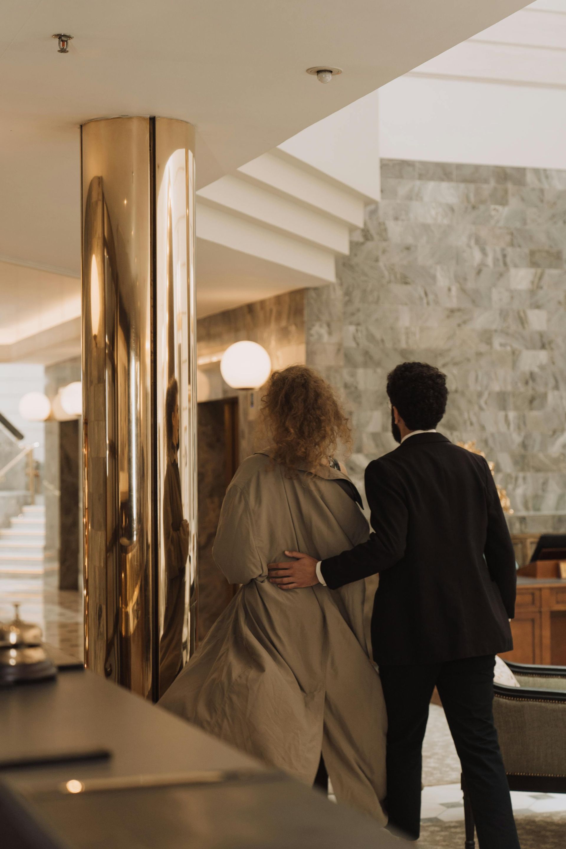 Elite couple walking away, symbolizing elite matchmaker Houston and luxury matchmaking service