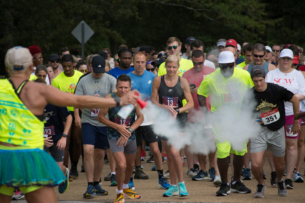 A group of people are running in a race.