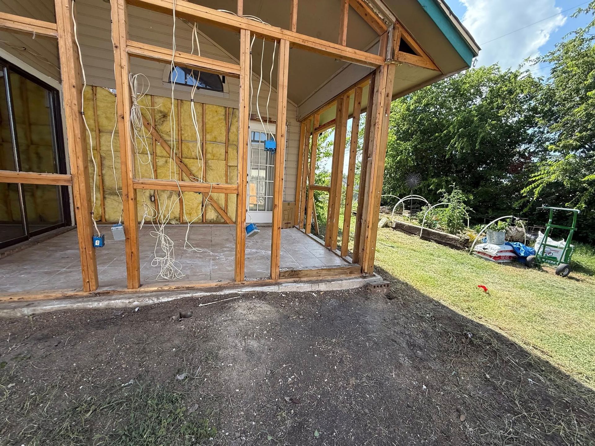 A house is being built with a lot of wood and insulation.