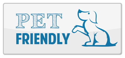 "Pet Friendly" sign with a blue dog illustration.