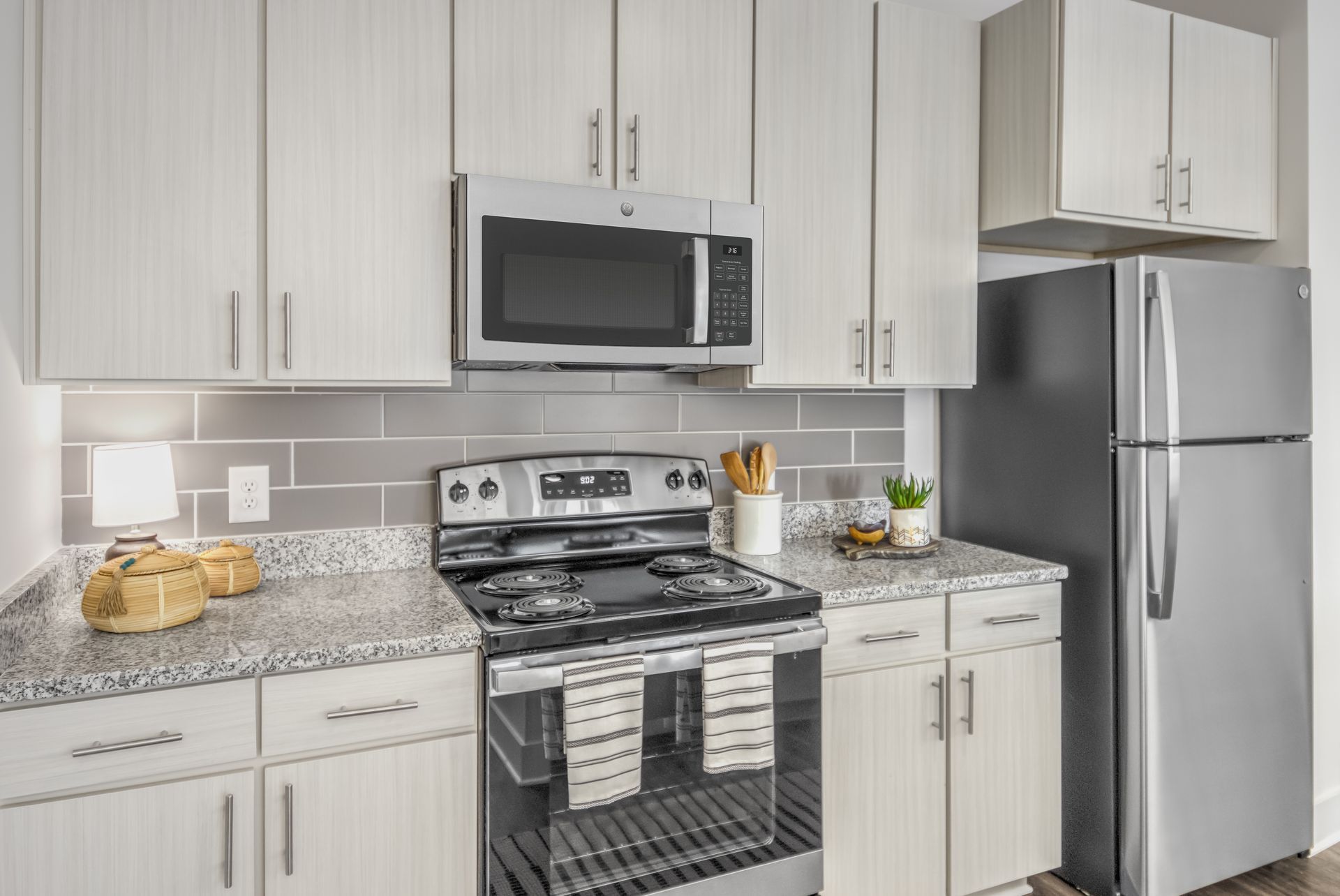 Modern apartment kitchen with stainless steel appliances at Marlowe Place in Montclaire South, Charlotte