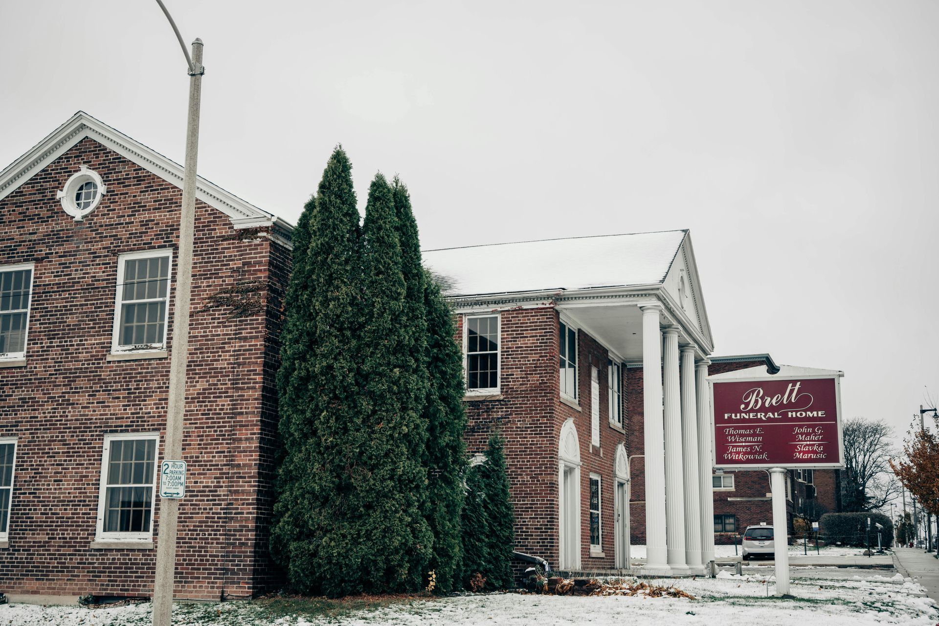 A large brick building with a sign that says ' bell ' on it