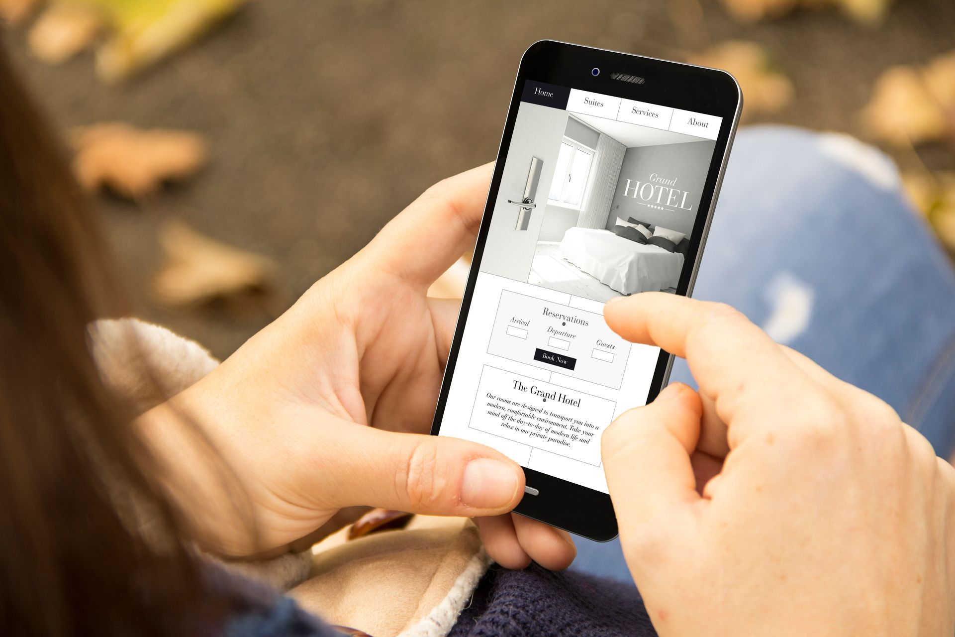 woman looking a landing page on mobile phone