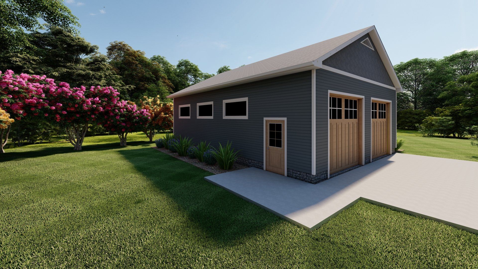 A large garage with two garage doors is sitting in the middle of a lush green field.