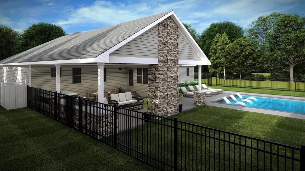 A house with a fence and a pool in the backyard.