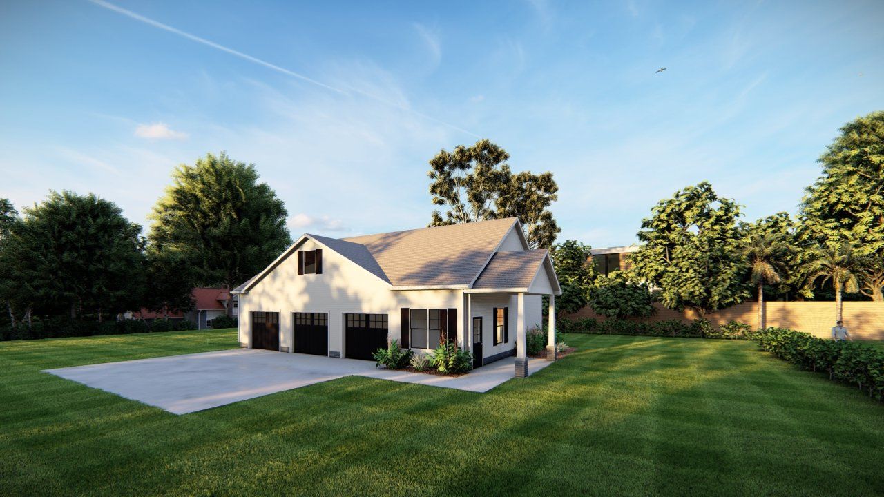 A white house with two garages is sitting in the middle of a lush green field.
