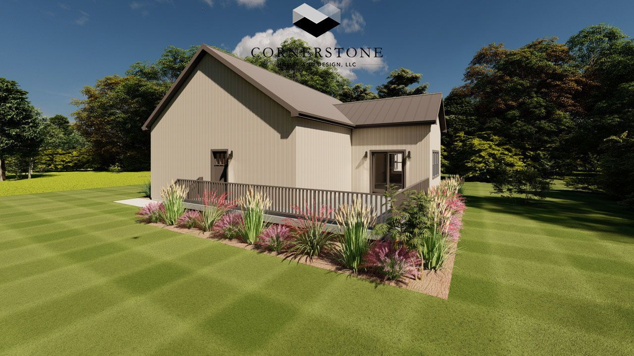 A small house is sitting in the middle of a lush green field.