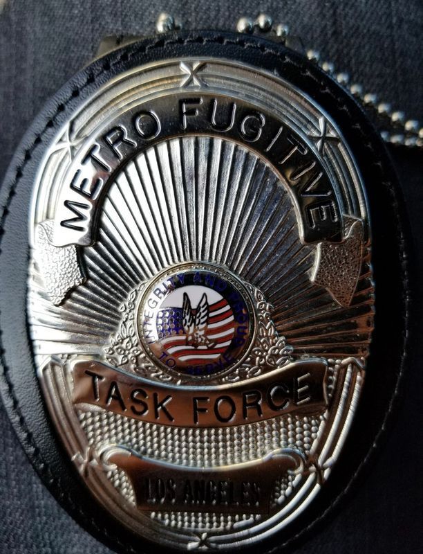 A badge for the metro fugitive task force