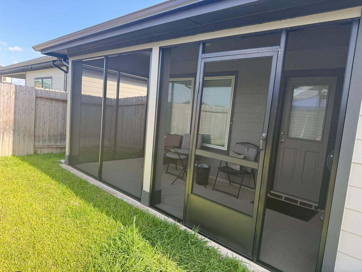 Wind-resistant screen enclosure for Houston area homes protecting patio space against severe weather