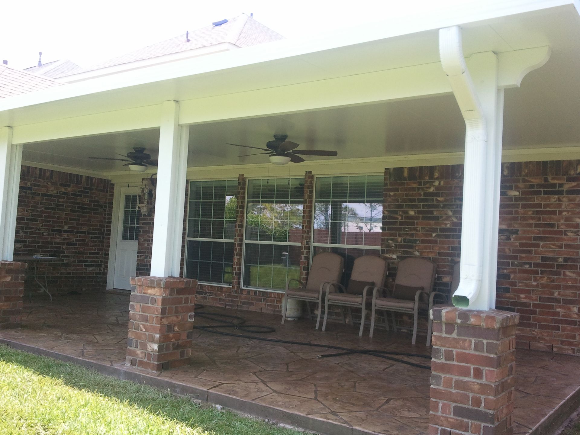 Single slope patio cover attached to house