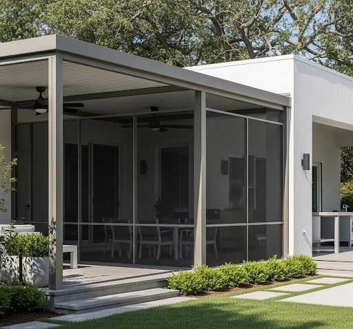 Aluminum patio cover with ceiling fan and enclosed screen mesh walls in Willis TX