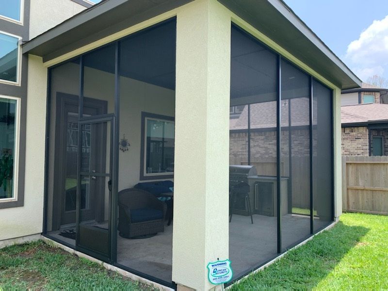 Custom aluminum screen room in Houston, engineered for WPI-8 windstorm certification and HOA complia