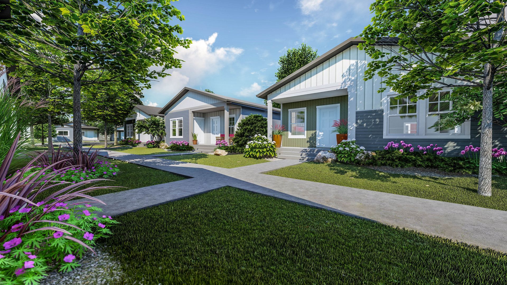 Modern suburban homes with white trim, green lawns, and a curved sidewalk under sunny blue skies