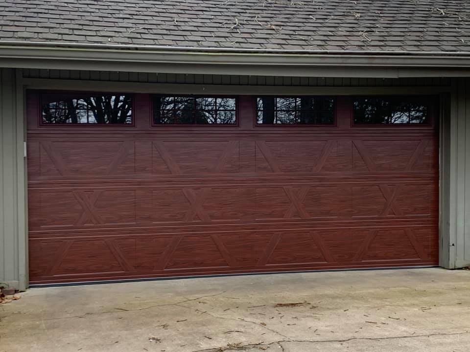 Installing Garage Door — Okmulgee, OK — Kingdom Door Company