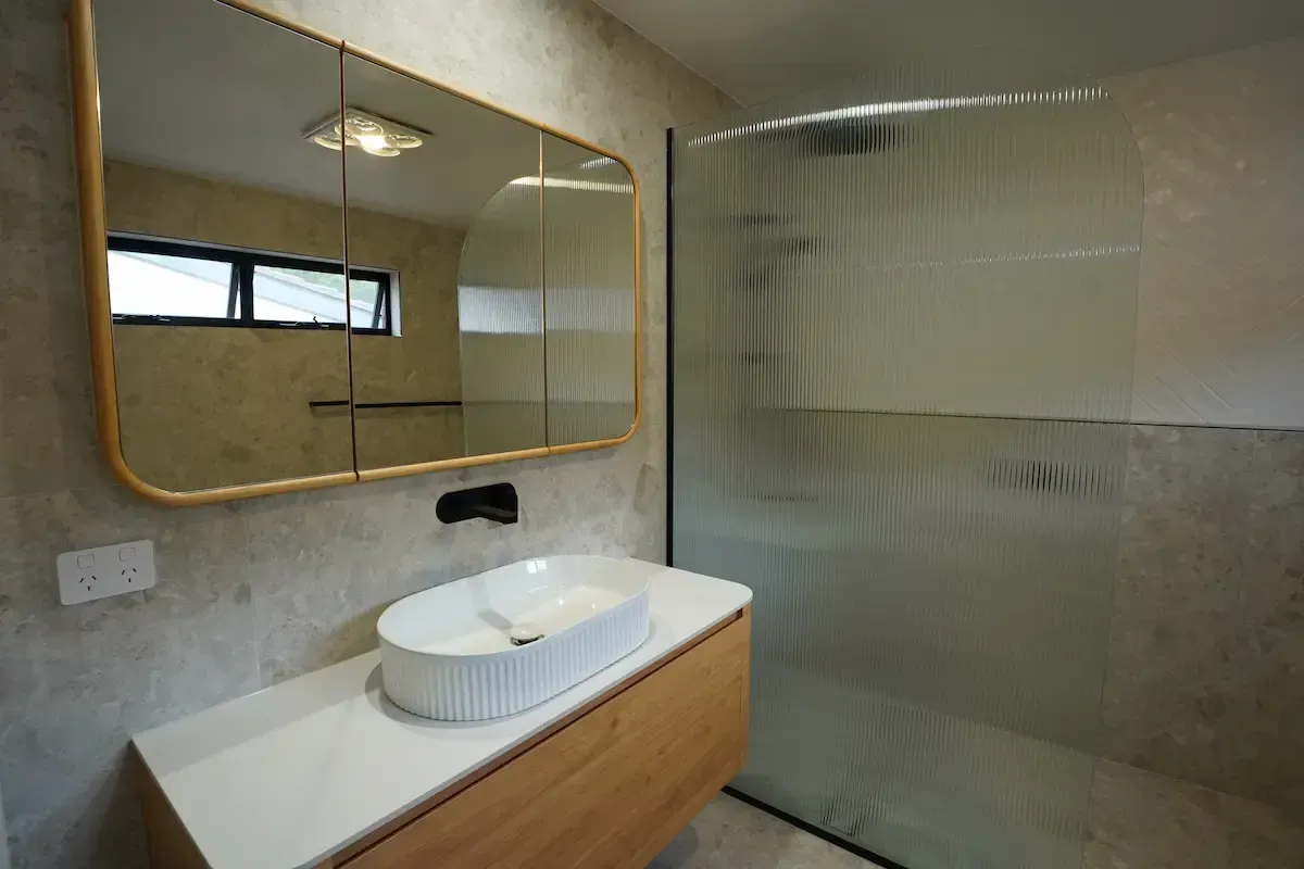 Renovated bathroom in a Canberra home by J&J Renovations