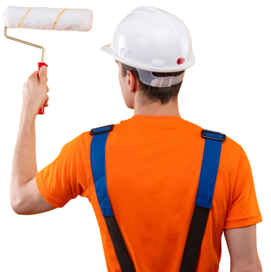 Worker in orange shirt and white hard hat painting a wall with a roller