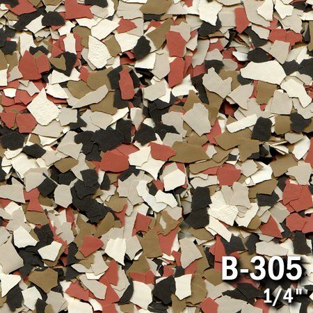 Close-up of multicolored epoxy floor flakes in shades of beige, brown, red, and black.