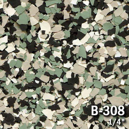 Epoxy floor flakes in camouflage pattern, including green, beige, black, and white.