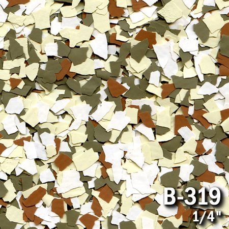 Close-up of a speckled flooring flake pattern, with cream, brown, white, and green fragments. Labeled 