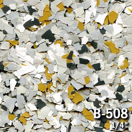 Multi-colored floor flakes in gray, white, gold, and dark gray, labeled 