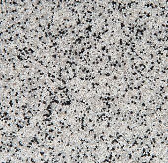 Speckled light gray and black textured surface.