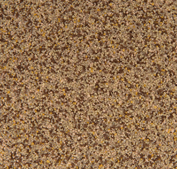 Close-up view of a grainy, speckled surface with varying shades of brown, beige, and yellow.