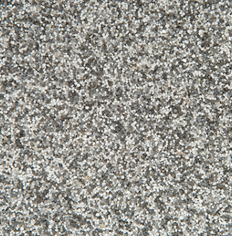 Close-up of a speckled, gray and white gravel texture.