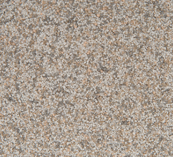 Textured surface of small, speckled beige and tan granules.