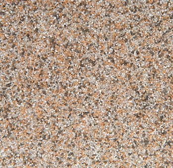 Close-up of a speckled, textured surface with shades of tan, white, and brown.