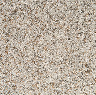 Close-up of a speckled beige and brown aggregate texture, resembling fine gravel or sand.