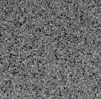 Gray speckled surface, possibly aggregate or granite.