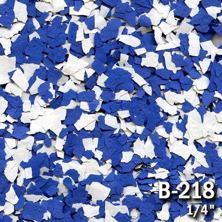 Blue and white floor flakes scattered on a surface, labeled B-218, 1/4