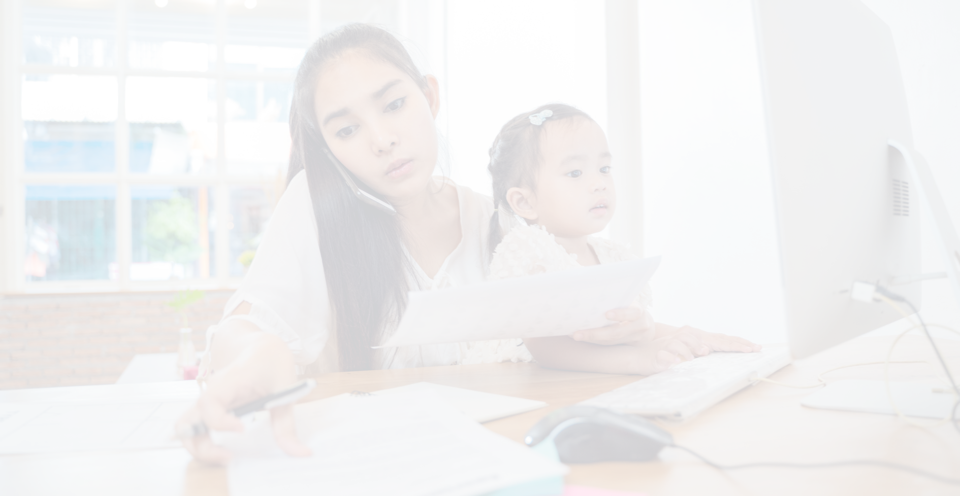 Woman at work with child