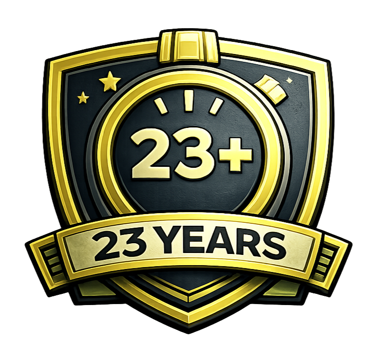 Shield-shaped emblem with gold and black accents. Displays 