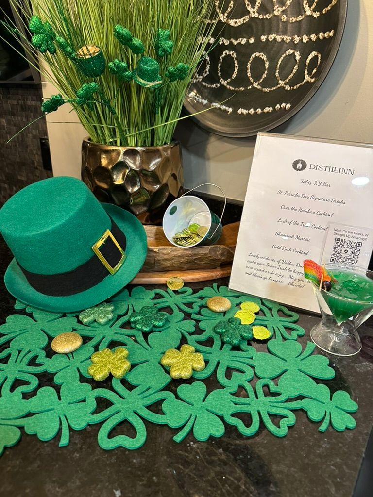 St. Patrick’s Day display with green leprechaun hat, shamrocks, and festive decorations on a table