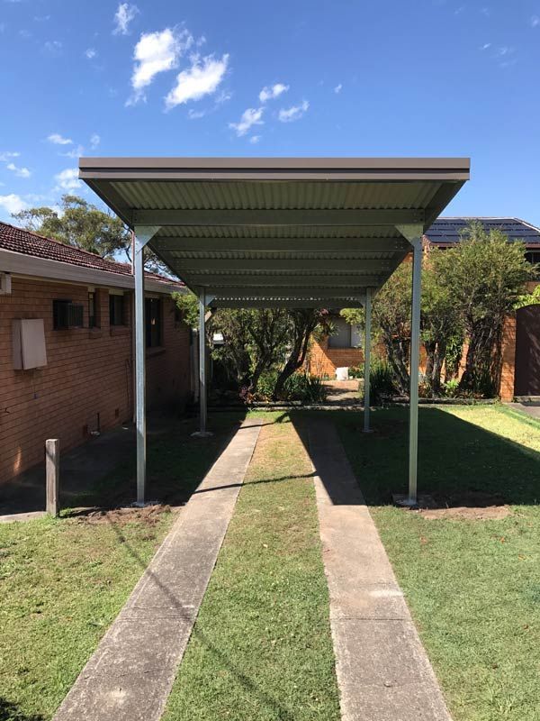 There Is A Carport In The Middle Of A Driveway – South Kempsey NSW - Fair Dinkum Builds Macleay Valley Sheds