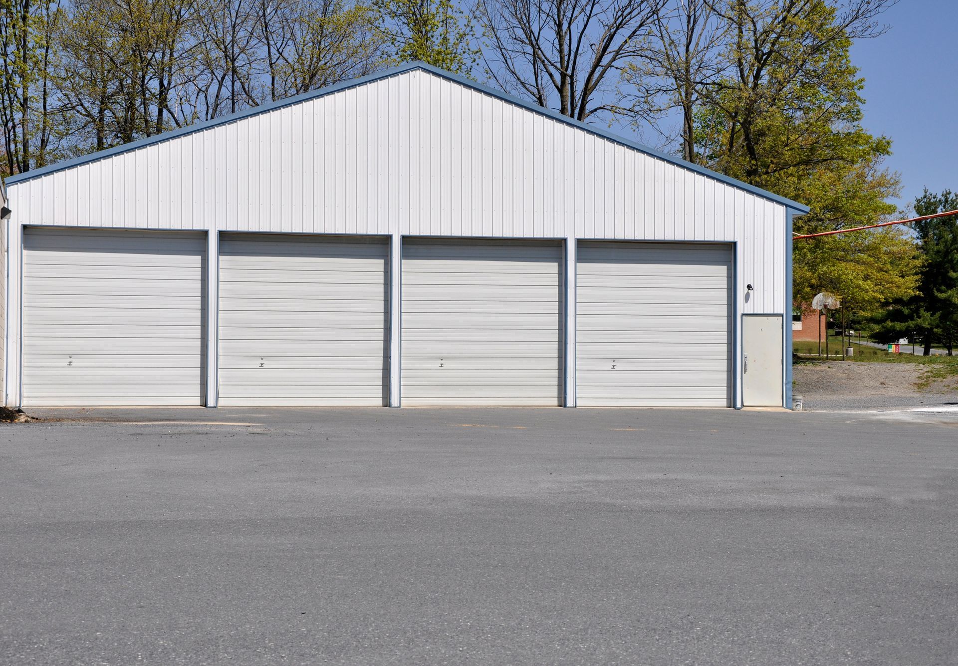 View of a backyard structure showcasing a custom shed with expert construction details. View of a backyard structure showcasing a custom shed with expert construction details.