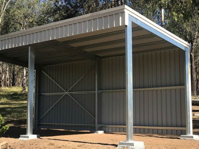 A Metal Shed Is Sitting On Top Of A Dirt Hill – South Kempsey NSW - Fair Dinkum Builds Macleay Valley Sheds