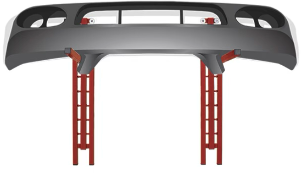 Car bumper suspended on red support stands.