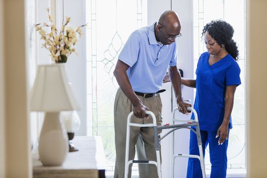Health Care Member Talking to Senior — Charlotte, NC — United Home Care and Health Solutions, Inc. Health Care Member Talking to Senior — Charlotte, NC — United Home Care and Health Solutions, Inc.