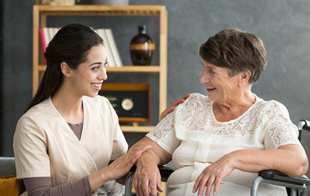 Caregiver Helping Senior Citizen — Charlotte, NC — United Home Care & Health Solutions, Inc.