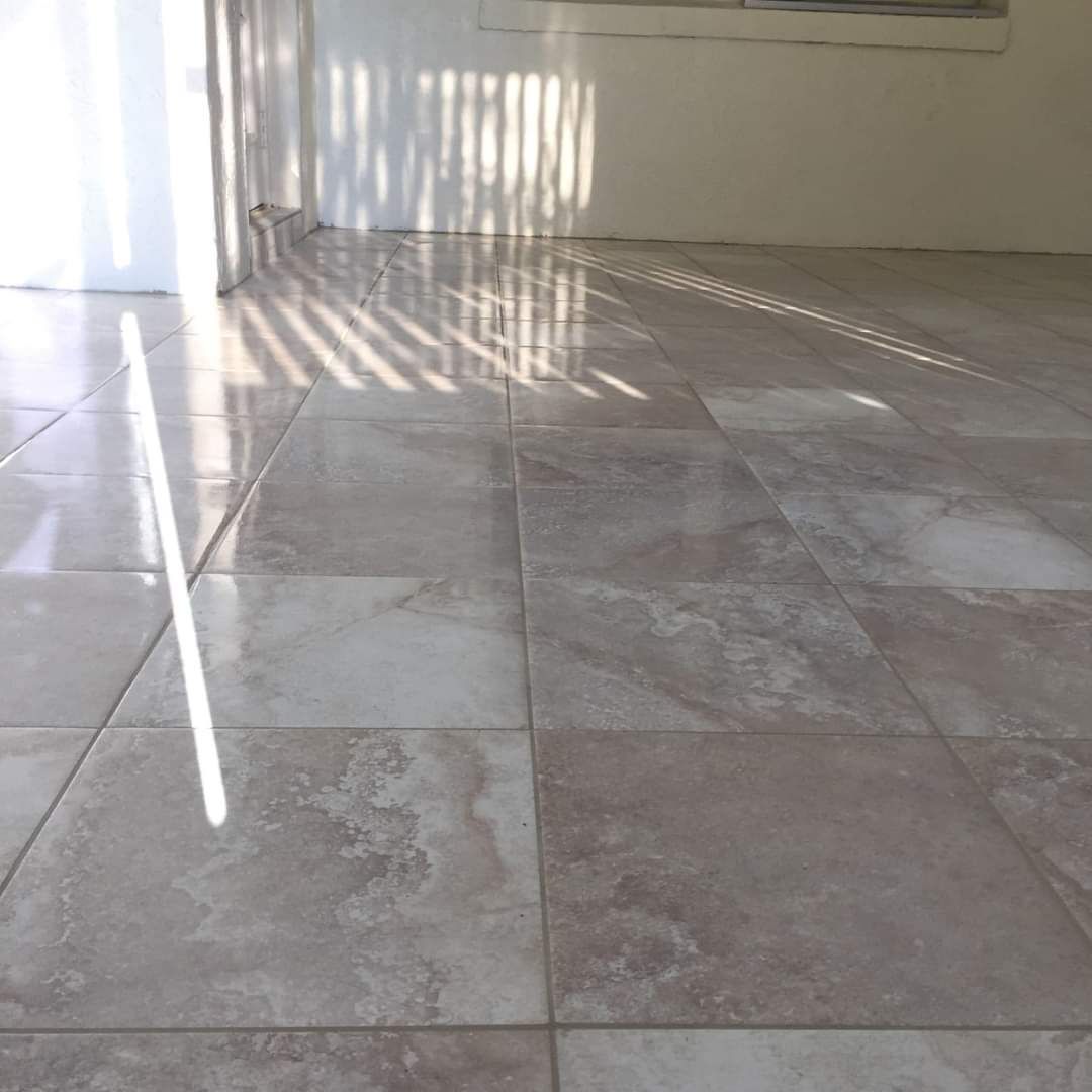 A close up of a tiled floor in a room