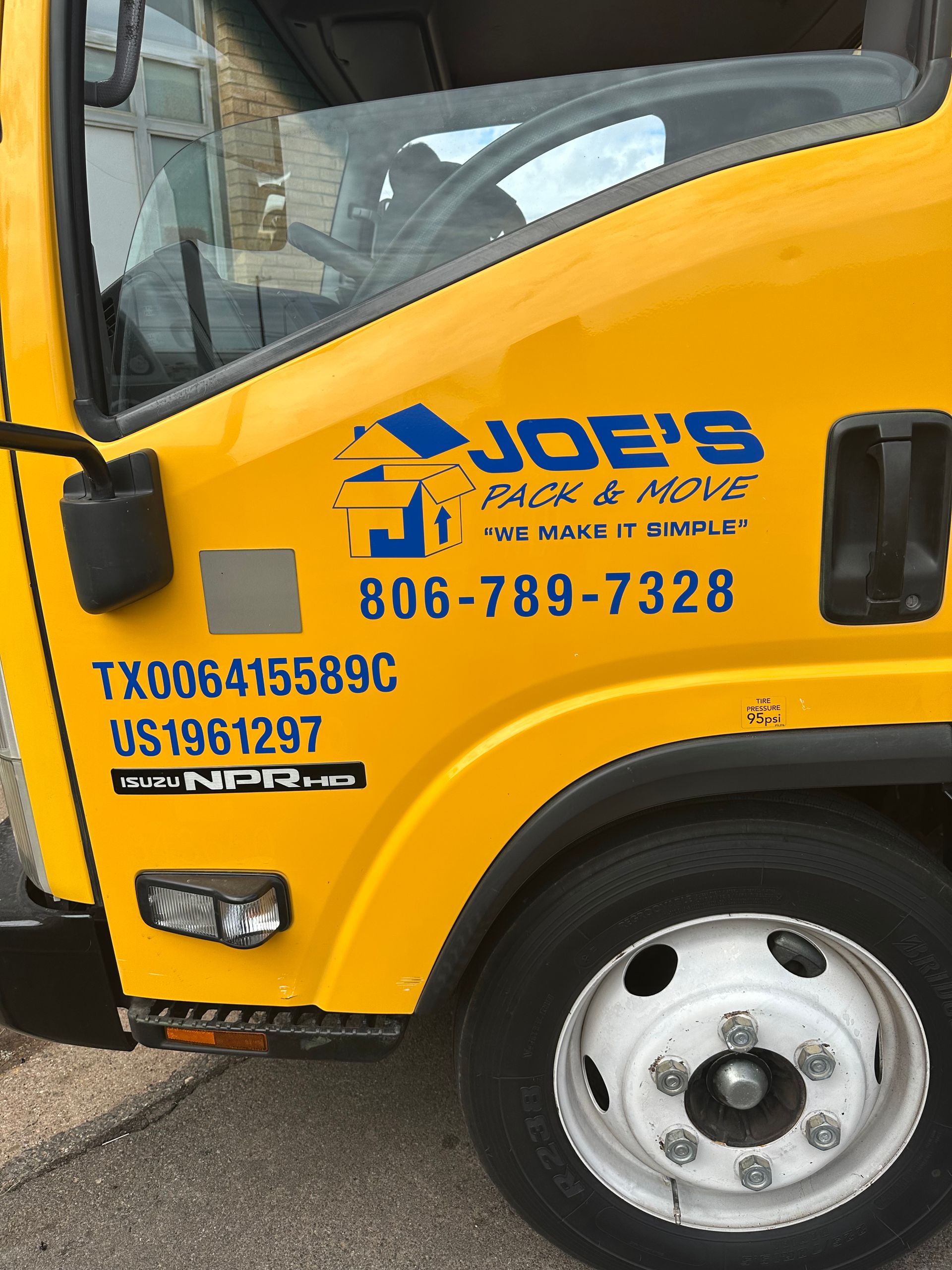 Joe's Pack & Move crew member on a job site in Lubbock TX